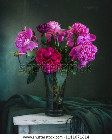 still-life with flowers. a bouquet of peonies. vintage.