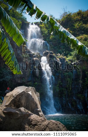 Waterfall in "Bassin des Aigrettes" Reunion Island Royalty-Free Stock Photo #1111095065
