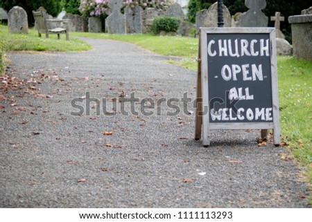 A sign for an open church for all welcome to visit