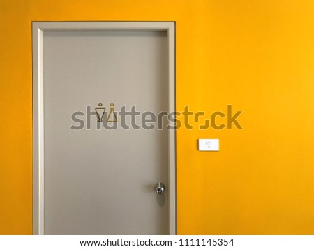 Switch to the bathroom with yellow walls