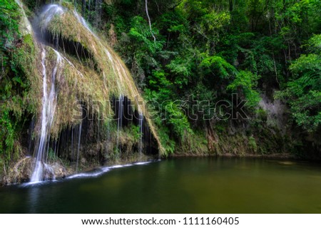 Pha Nam Yod Waterfall in tropical deep forest at Kaeng krachan Phetchaburi, Thailand.