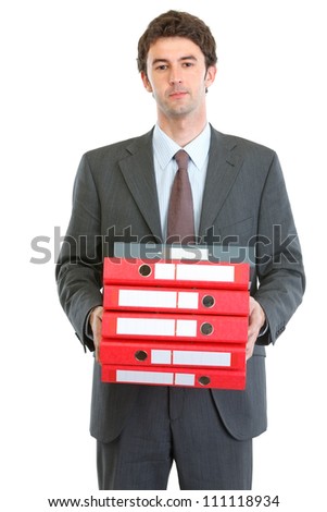Modern businessman holding pack of folders