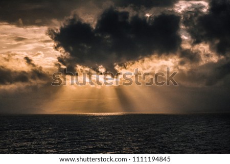 Sun light with clouds and sea