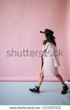 Smart girl in the pink coat 