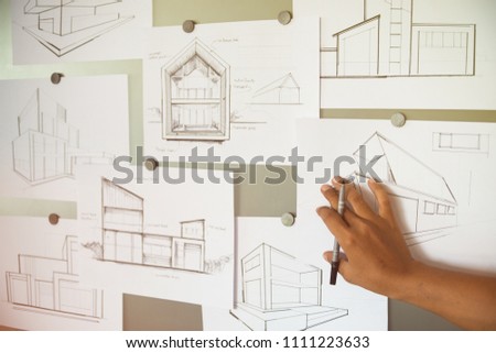 Architect Designer Engineer sketching drawing draft working Perspective Sketch  design house construction Project