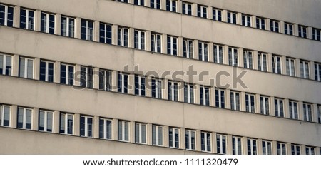 facade of a socialist building with windows