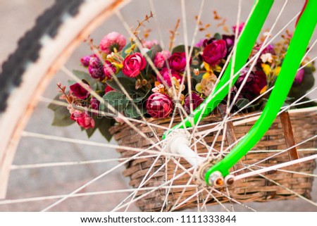 Bicycle with flowers in the old city background
