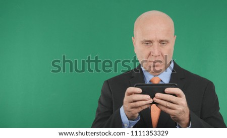 Preoccupied Businessman Text Using Cell Phone