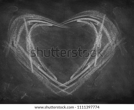 Heart drawn on black board 