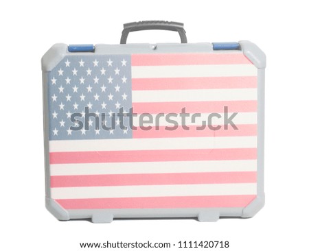 Business travel suitcase with flag of USA isolated on a white background