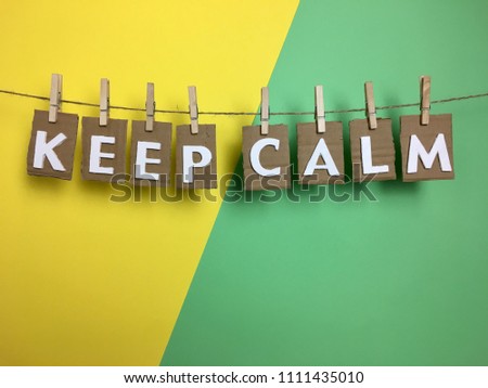 phrase "Keep calm" on green and yellow background "