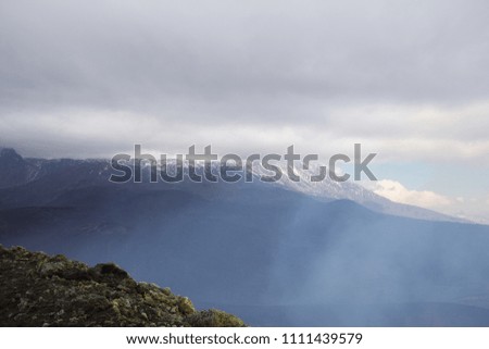 Volcanic lanscape, slopes of the volcano clouded with haze, Tolbachik, Kamchatka Peninsula