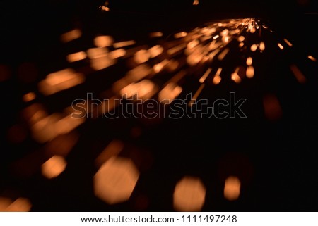  Bokeh lights on  white background,shot of flying fire sparks in the air,Firestorm texture.  
