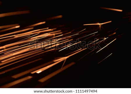  Bokeh lights on  white background,shot of flying fire sparks in the air,Firestorm texture.  
