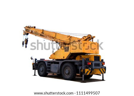 Yellow truck crane drop on the road and stand by for industry, heavy construction, isolate on white background with clipping path  Royalty-Free Stock Photo #1111499507