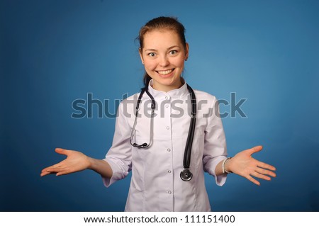 Portrait of a young friendly female doctor