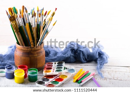 Brushes, paints and accessories for drawing
 Royalty-Free Stock Photo #1111520444