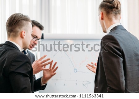communication discussion. man explaining his idea. coworkers at business briefing talking over company results