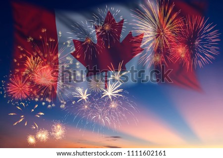 Holiday sky with fireworks and flag of Canada, independence day Royalty-Free Stock Photo #1111602161