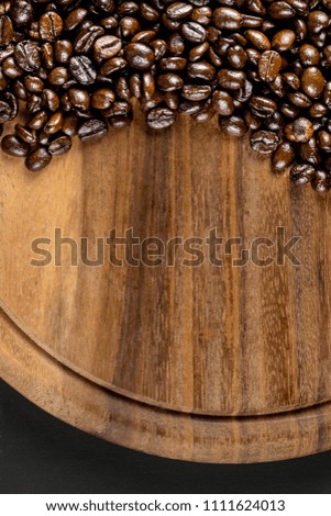 Pictures of coffee beans on wooden backdrop You can decorate it in cafes, equipment, labels, or even for editing purposes.