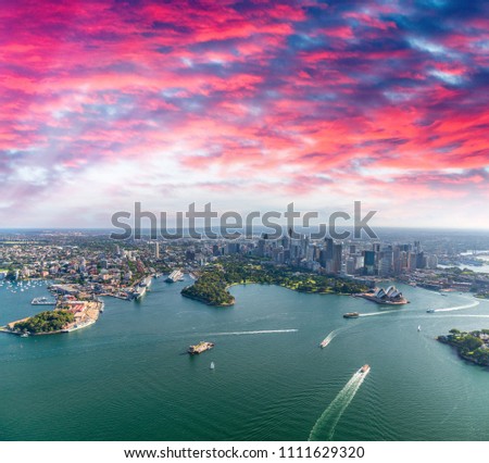 Aerial view of Sydney Harbor, Downtown Skyline and Royal Botanic Gardens, Australia.