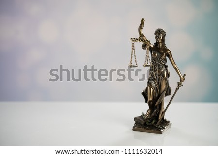 Goddess of justice on a light background