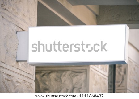 Mock up. Empty round signboard on classical architecture building.