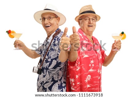 Elderly tourist with cocktails making thumb up gestures isolated on white background