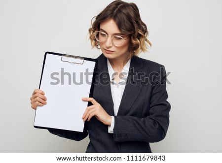    woman holding a folder-planets location free office                            
