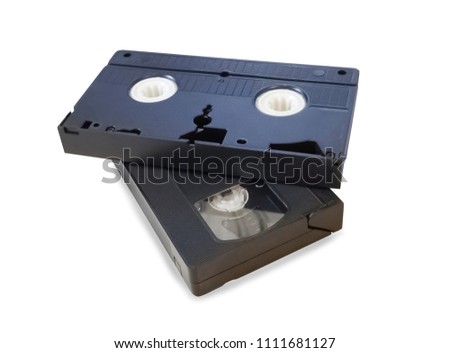 Two old black VHS tapes isolated over white