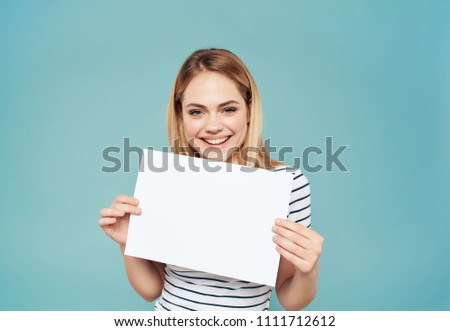  woman smiling holding a sheet of paper seat free                              