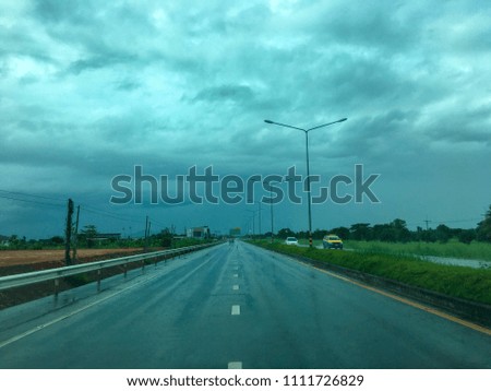 Traffic picture on the countryside. During the storm Heavy rain in the street