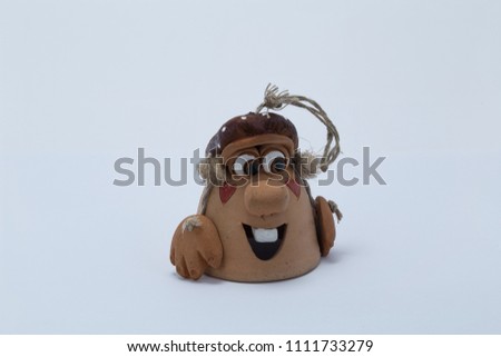Clay figure for suspension on a string
