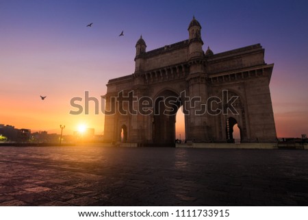 Gateway of India monument in Mumbai, India, at sunrise, tourism destination Royalty-Free Stock Photo #1111733915