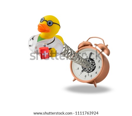Doctor rubber duck spring out of alarm clock