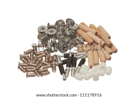 The closeup of many screws and dowels,background
