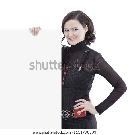 beautiful business woman holding a blank banner and showing thumb up