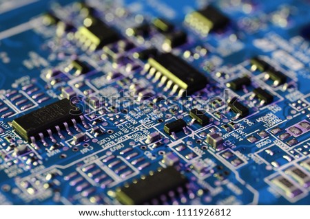 electronic components on a computer graphics card. close-up Royalty-Free Stock Photo #1111926812