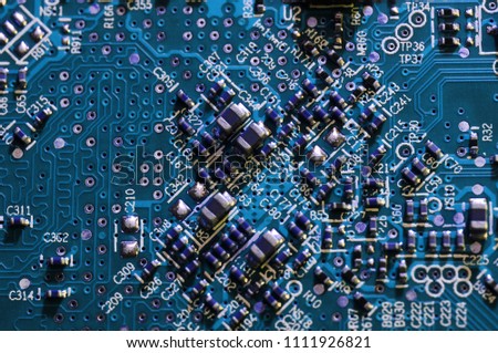 electronic components on a computer graphics card. close-up Royalty-Free Stock Photo #1111926821