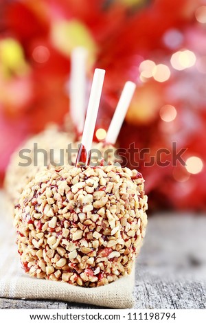 Three candy covered apples on napkin. Extreme shallow depth of field with selective focus on first apple.