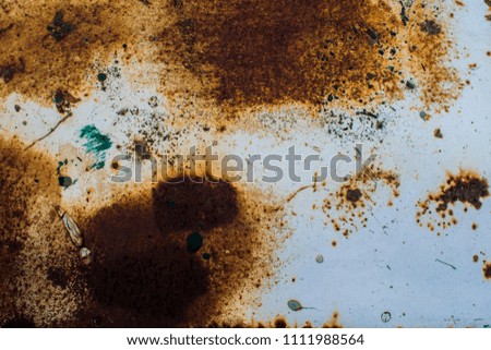 Rusty metal old background, shabby surface, brown for vintage and modern design. Multicolored rust. Paint spots.