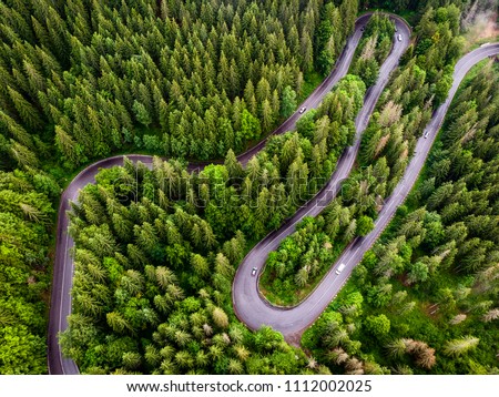 Aerial photography of a road from Transylvania. Aerial photography of a road crossing a forest.