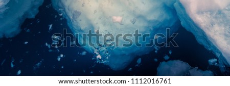 Banner of Iceberg in a dark sea
