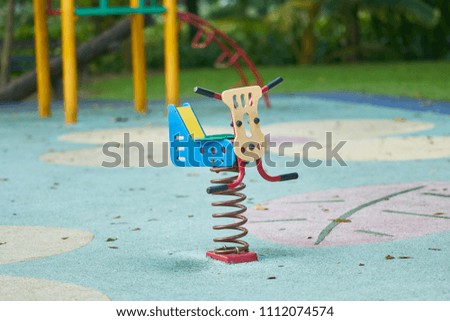 Spring see saw or toy in playground
