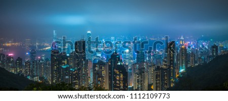 Panoramic view of Hong Kong city skyline at night
