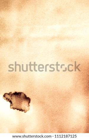 Blank aged paper sheet as old dirty frame background with dust and stains. Front view. Vintage and antique art concept. Detailed closeup studio shot. Toned