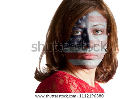 Woman face with painted USA flag isolated on a white background