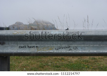 Crescent City California - 01/01/2008: Some positive graffiti on a guardrail near Point Saint George.