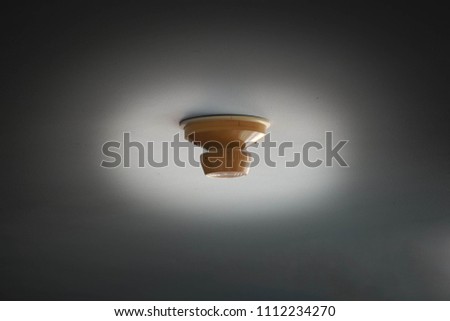 smoke detector on a ceiling