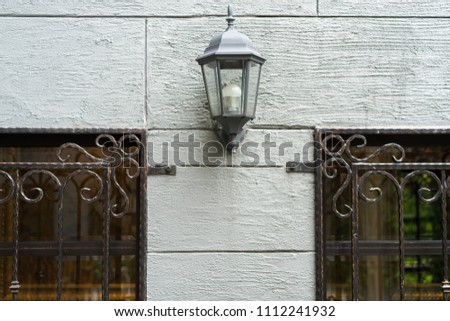 Wall lamp hanging on wall
